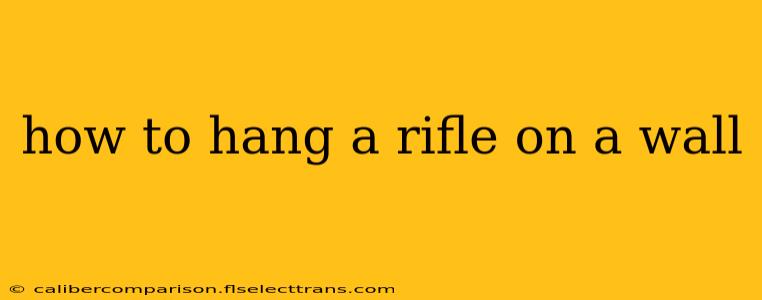 how to hang a rifle on a wall